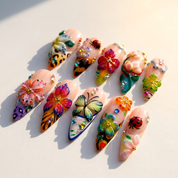 Blush Glaze press-on nails worn on hand – almond shape by Handora