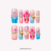 Ocean Hibiscus blue floral press-on nails by Handora