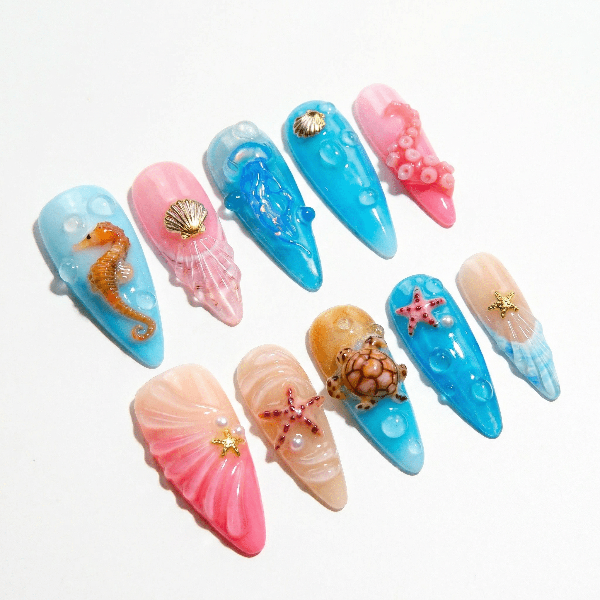 Marine Abyss press-on nails worn on hand – almond shape by Handora