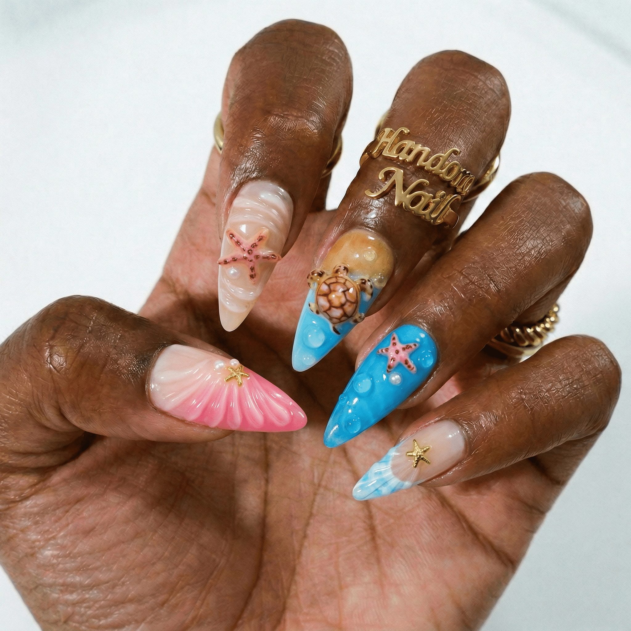 Marine Abyss press-on nails – hand-painted reusable gel set by Handora