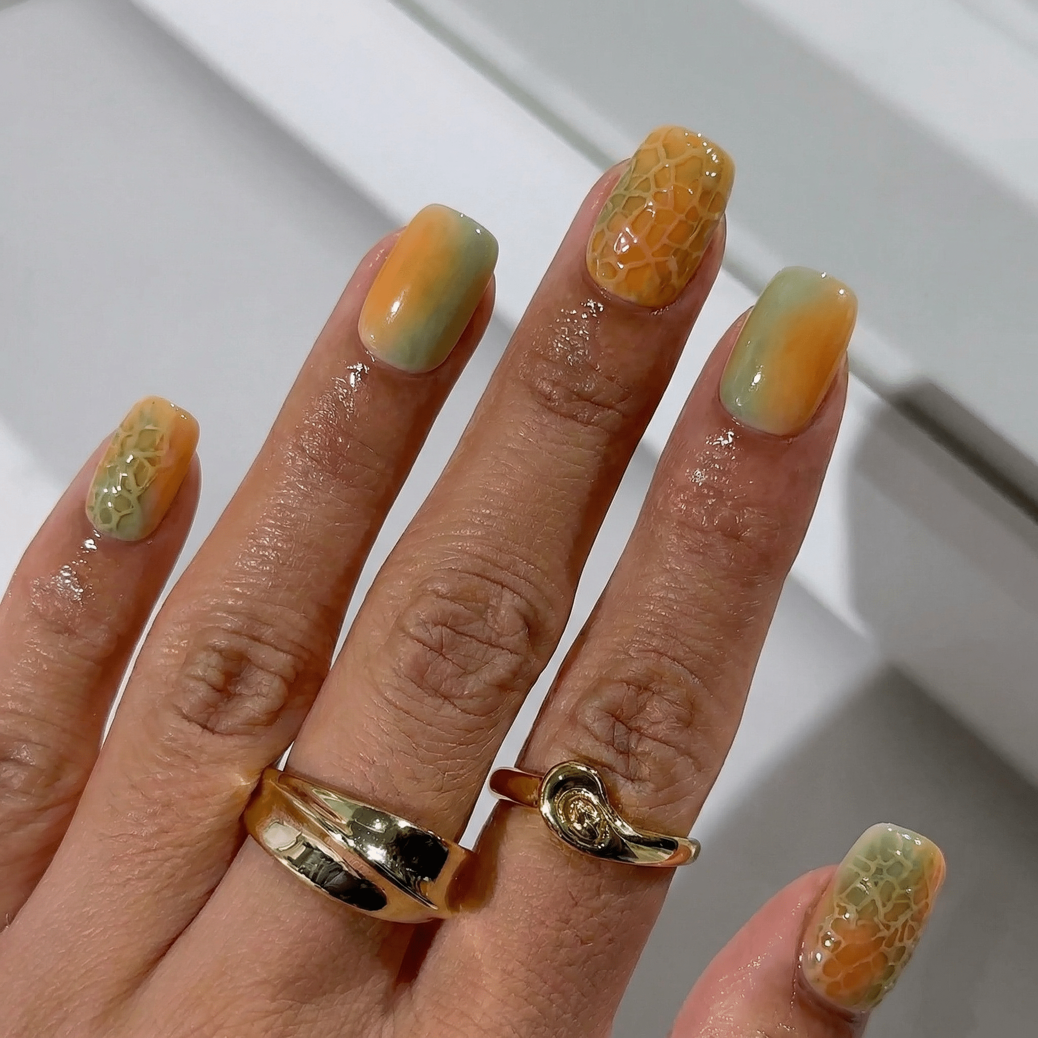 Melon Glow press-on nails – design close-up by Handora
