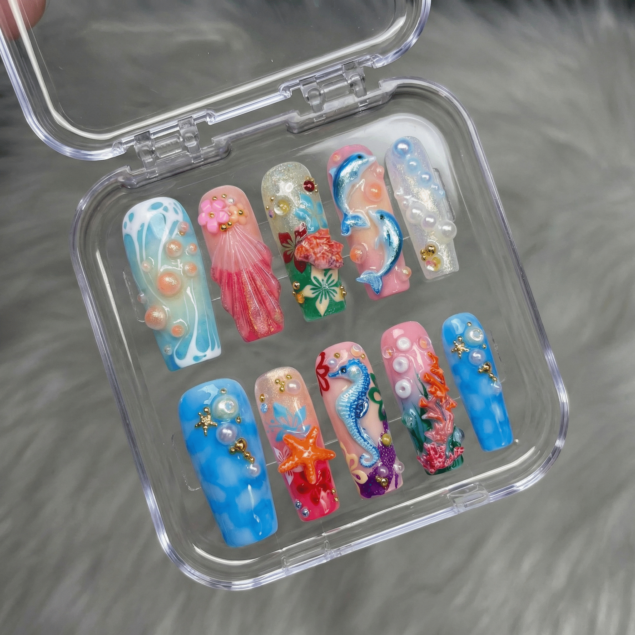 Mermaid Cove press-on nails worn on hand – square shape by Handora