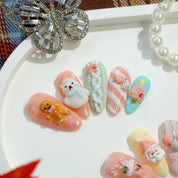Merry Pastel christmas nail design – handmade press-on nails by Handora