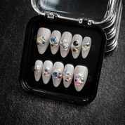 Molten Jewels almond press-on nails – design close-up by Handora