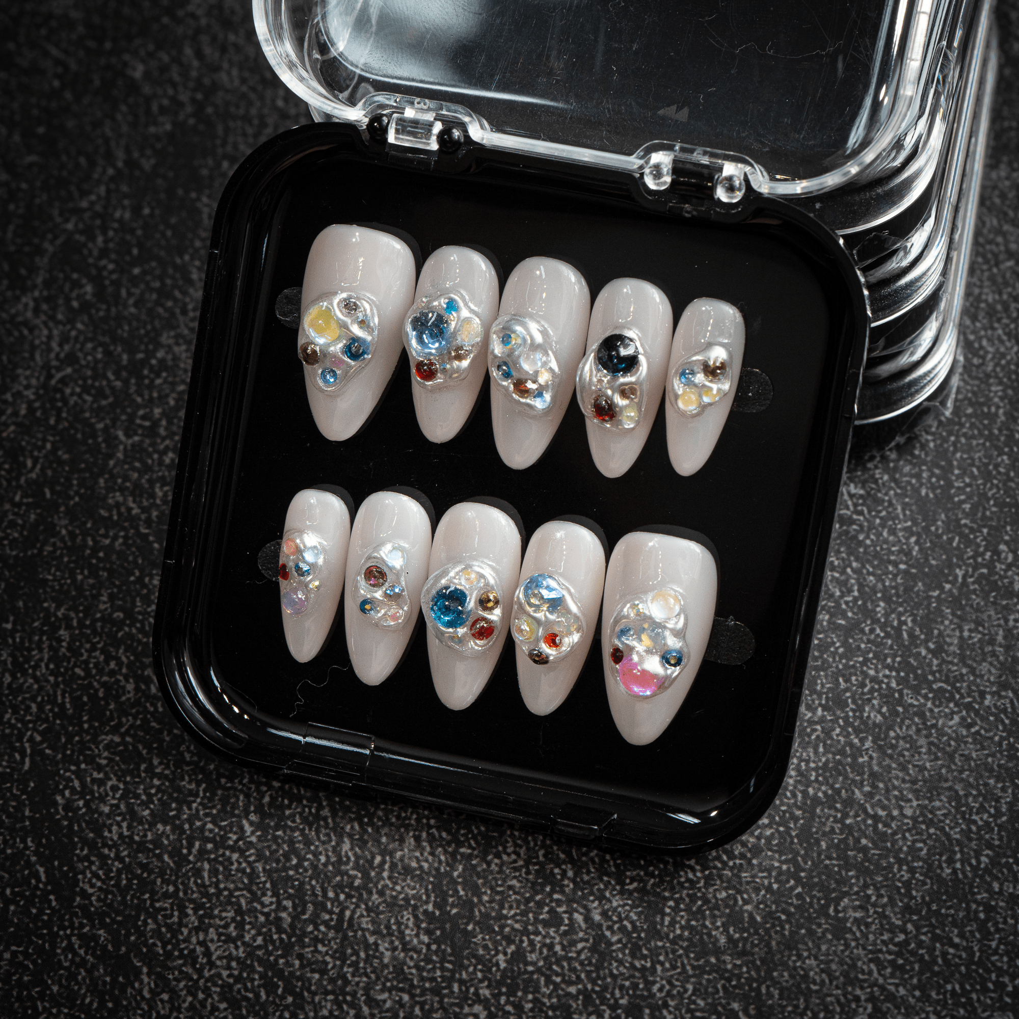 Molten Jewels almond press-on nails – design close-up by Handora