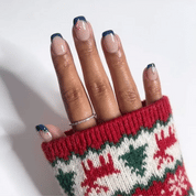 Navy Lights Christmas press-on nails - moving hand by Handora Nails
