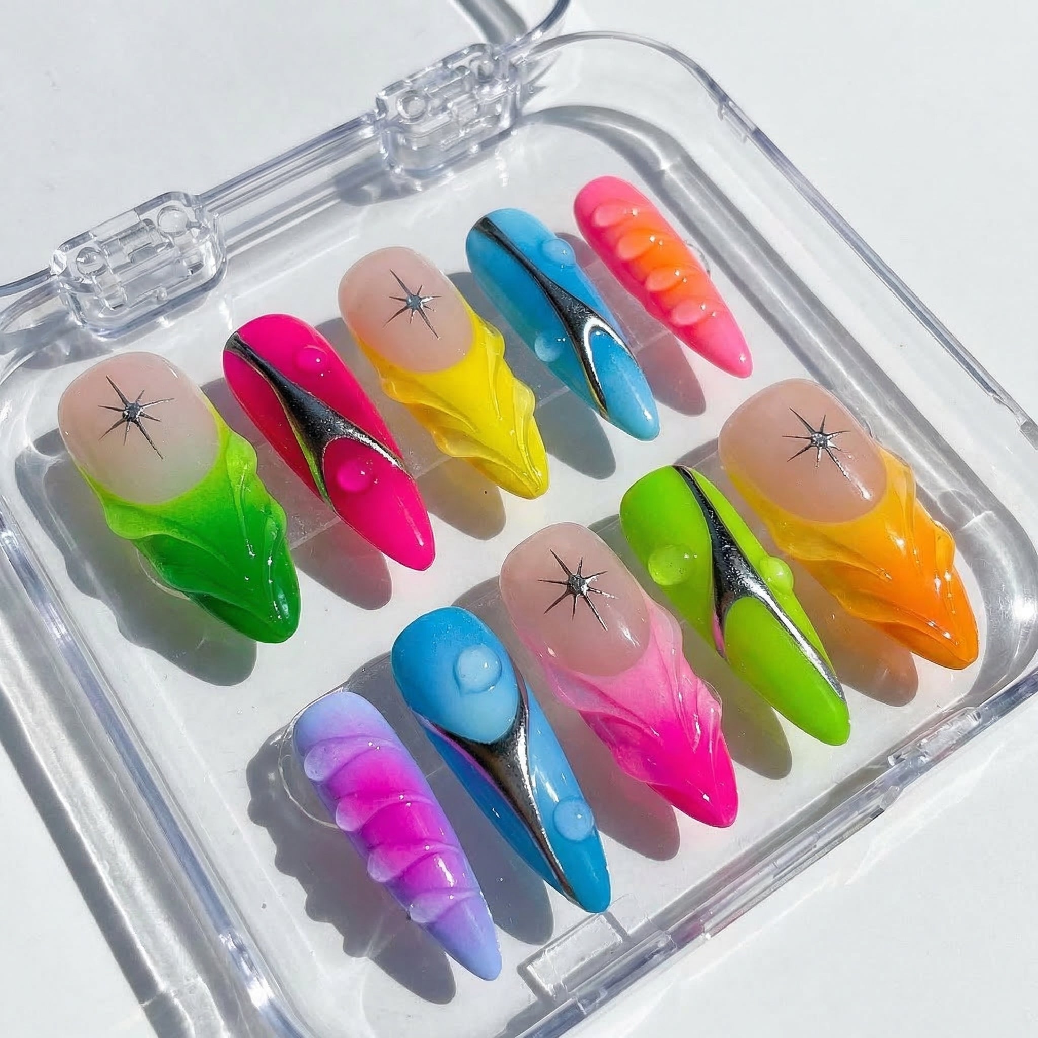 Neon Drip press-on nails worn on hand – almond shape by Handora