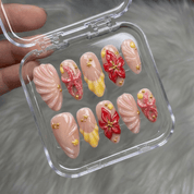 Ocean Bloom press-on nails worn on hand – almond shape by Handora