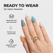 Ocean Charm almond press-on nails – design close-up by Handora