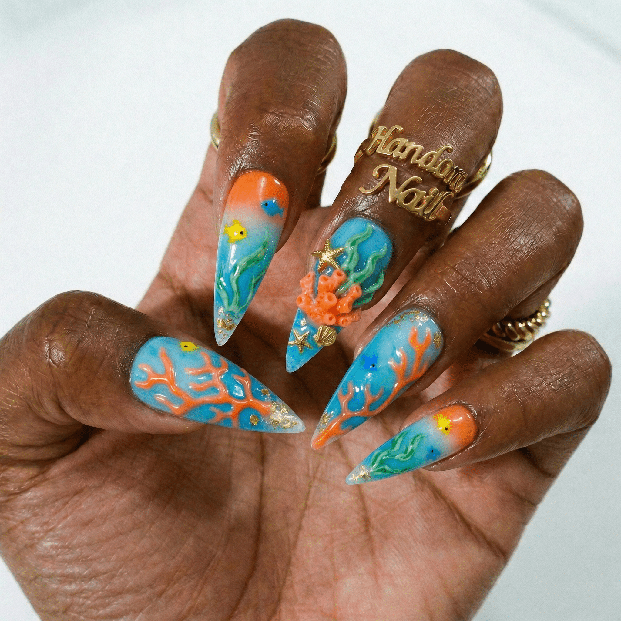 Ocean Coral press-on nails – hand-painted reusable gel set by Handora