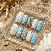 Ocean Pearl press-on nails worn on hand – coffin shape by Handora