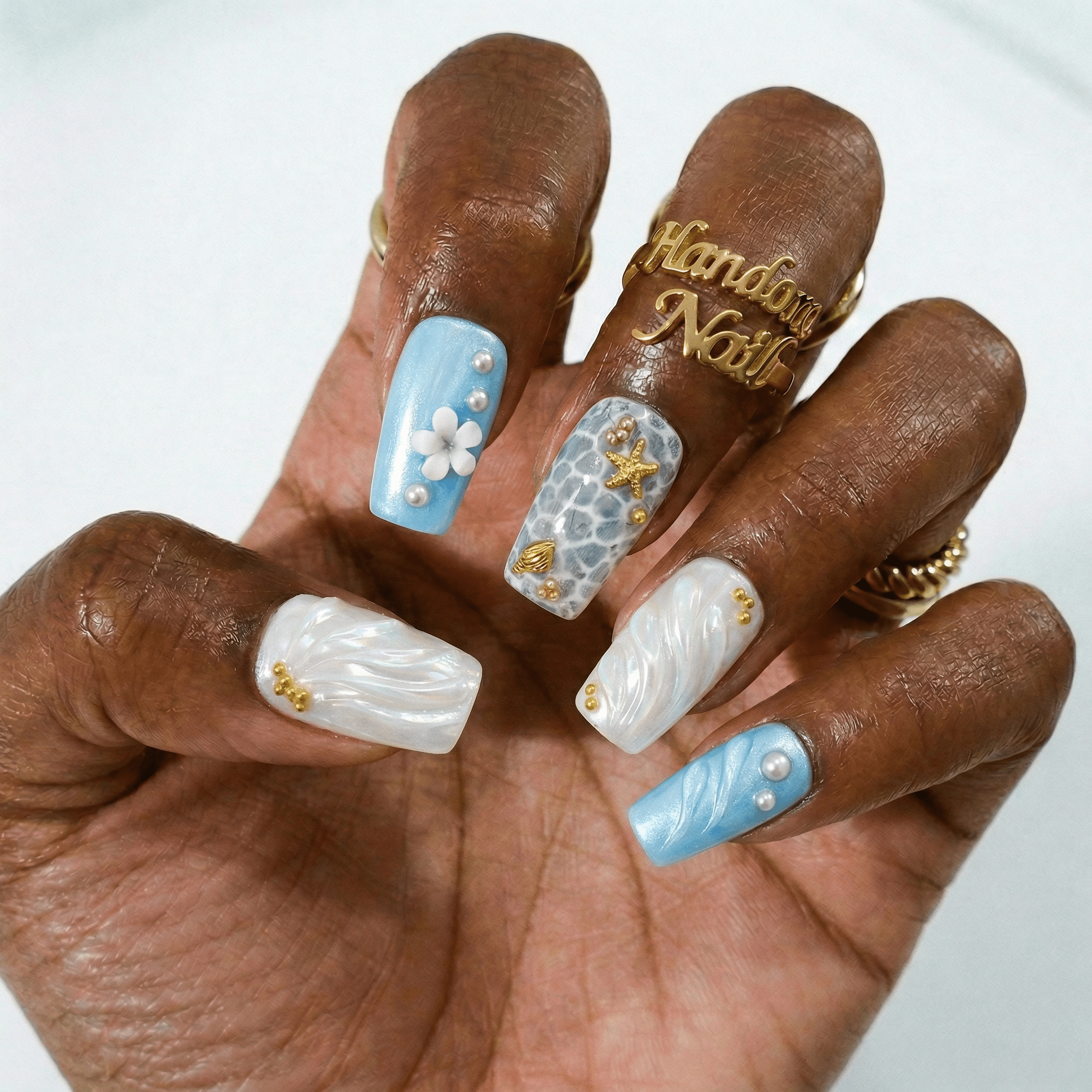 Ocean Pearl press-on nails – hand-painted reusable gel set by Handora
