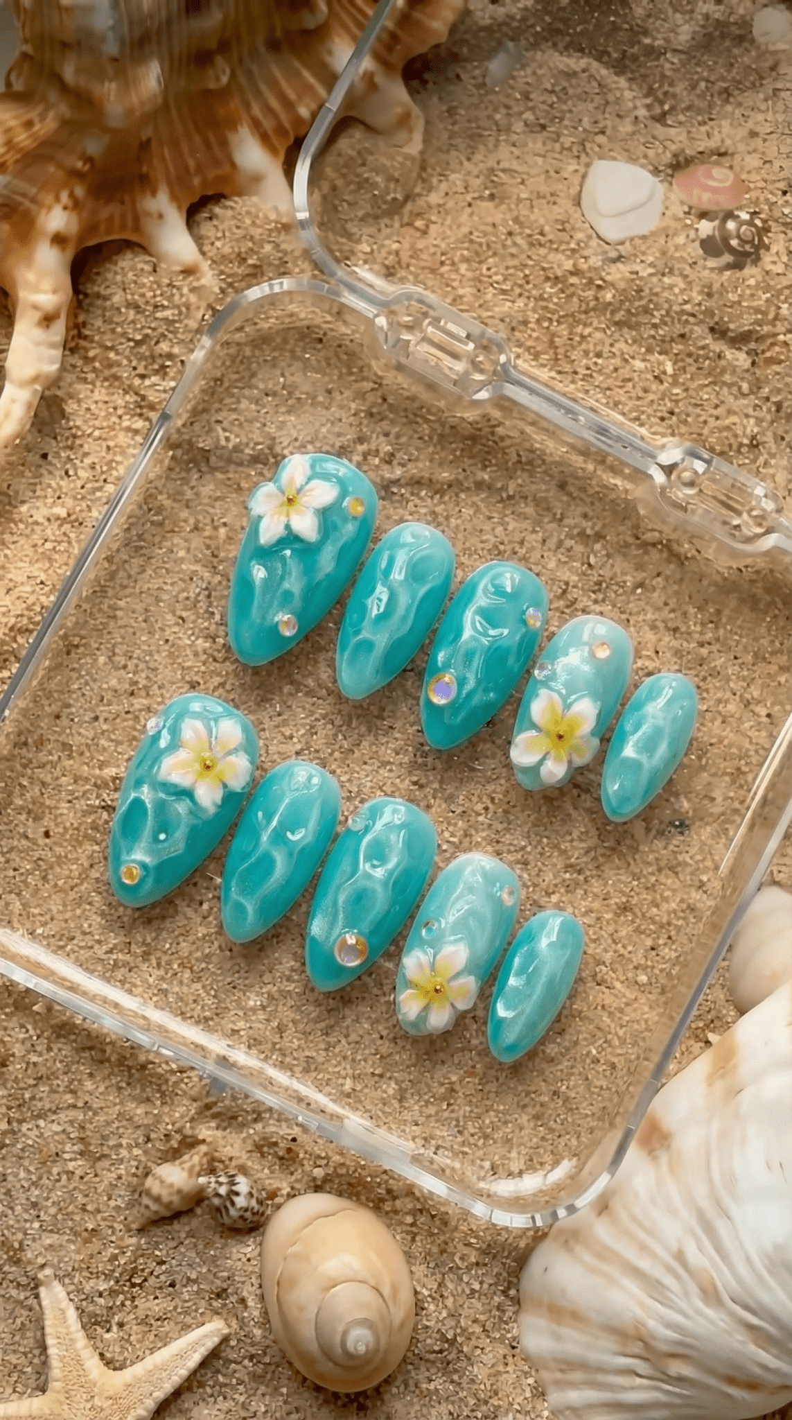 Ocean Plumeria blue press-on nails by Handora