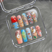 Ocean Reef press-on nails worn on hand – square shape by Handora