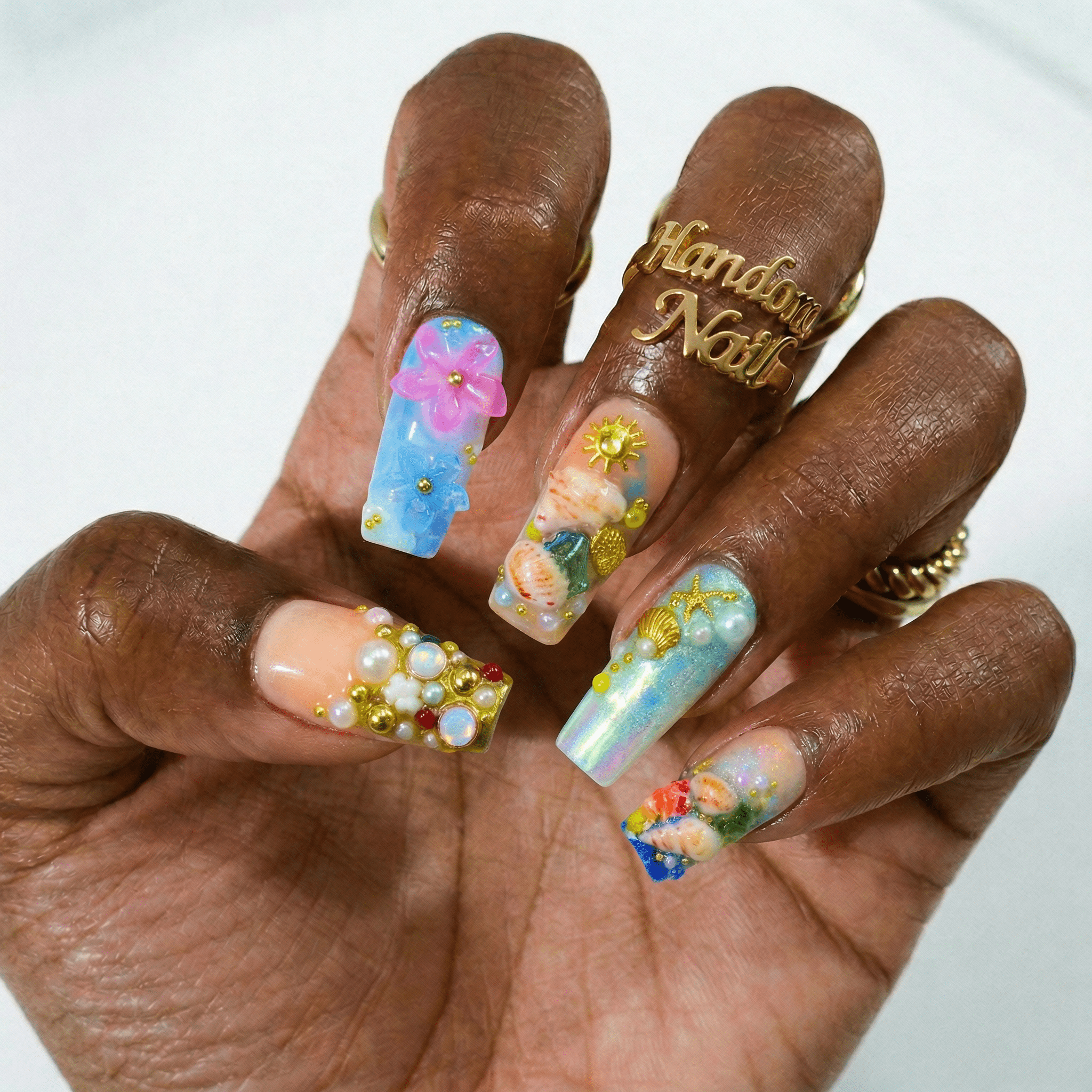 Ocean Shells press-on nails – hand-painted reusable gel set by Handora