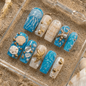 Ocean Treasures press-on nails – hand-painted reusable gel set by Handora