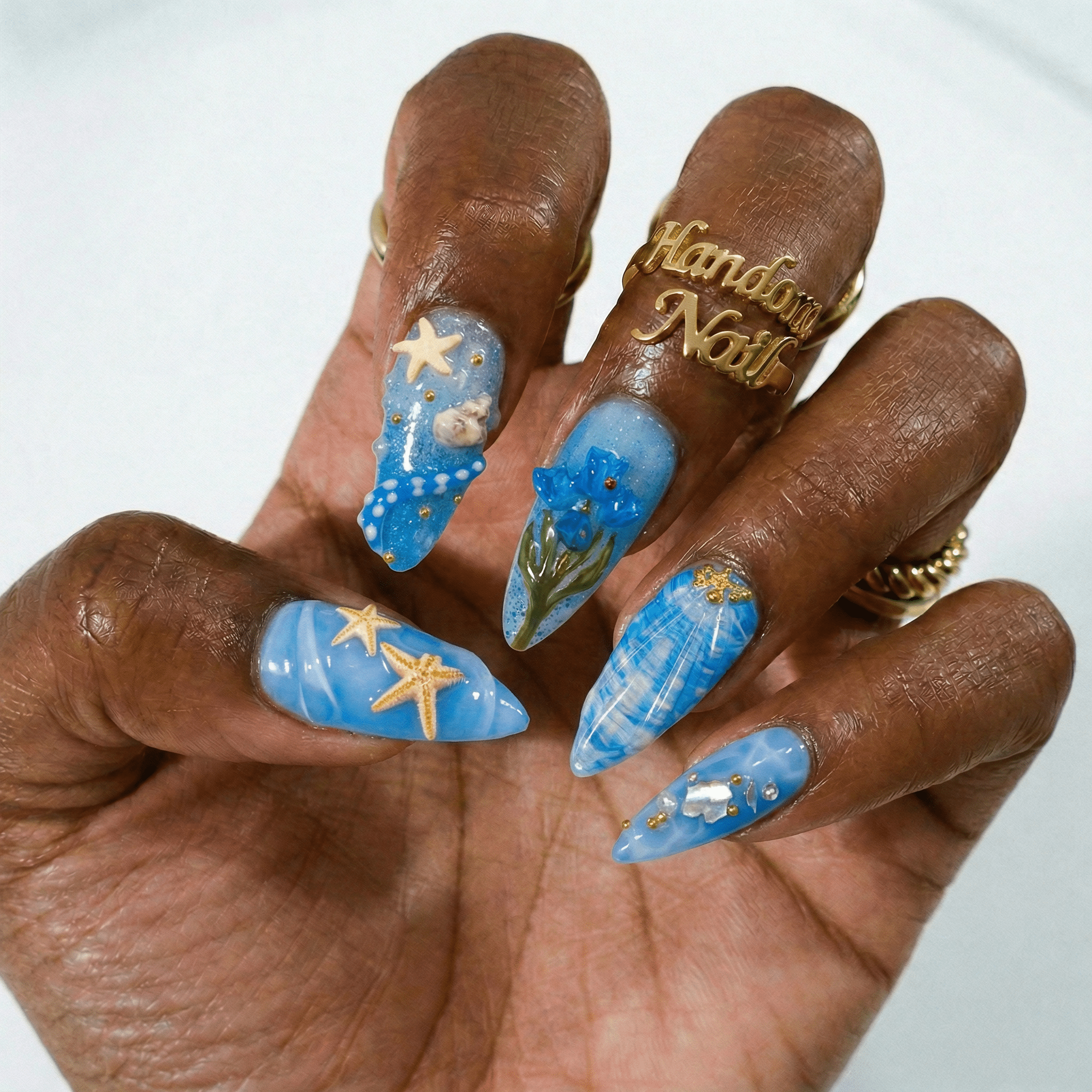 Ocean Wonders press-on nails – hand-painted reusable gel set by Handora