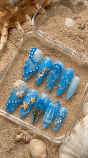Ocean Wonders blue press-on nails by Handora