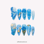 Ocean Wonders blue almond press-on nails by Handora