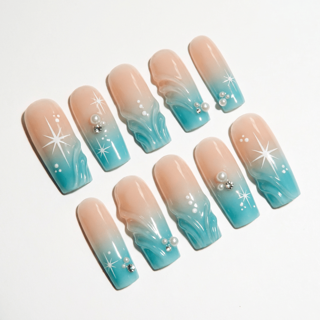 Oceanic Aura press-on nails worn on hand – almond shape by Handora