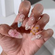 Oceanic Bloom press-on nails – hand-painted reusable gel set by Handora