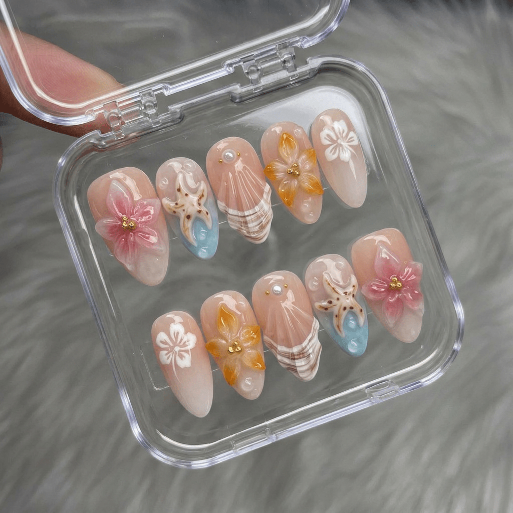 Oceanic Bloom press-on nails worn on hand – almond shape by Handora