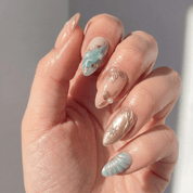 Oceanic Glimmer press-on nails – hand-painted reusable gel set by Handora