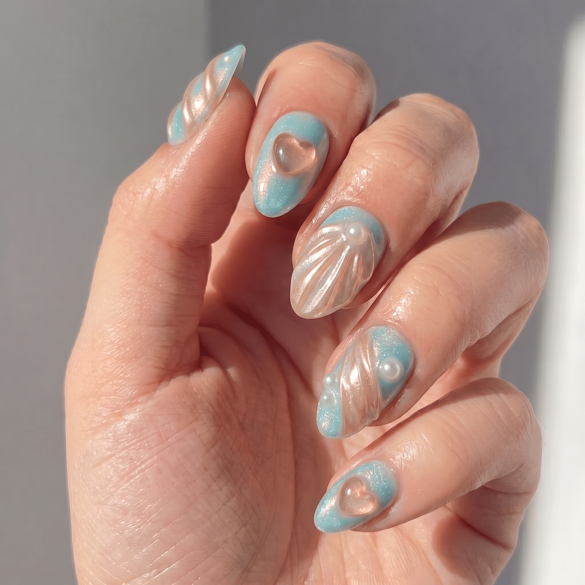 Oceanic Heart nail design – handmade press-on nails by Handora