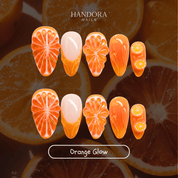 Orange Glow press-on nails – hand-painted reusable gel set by Handora