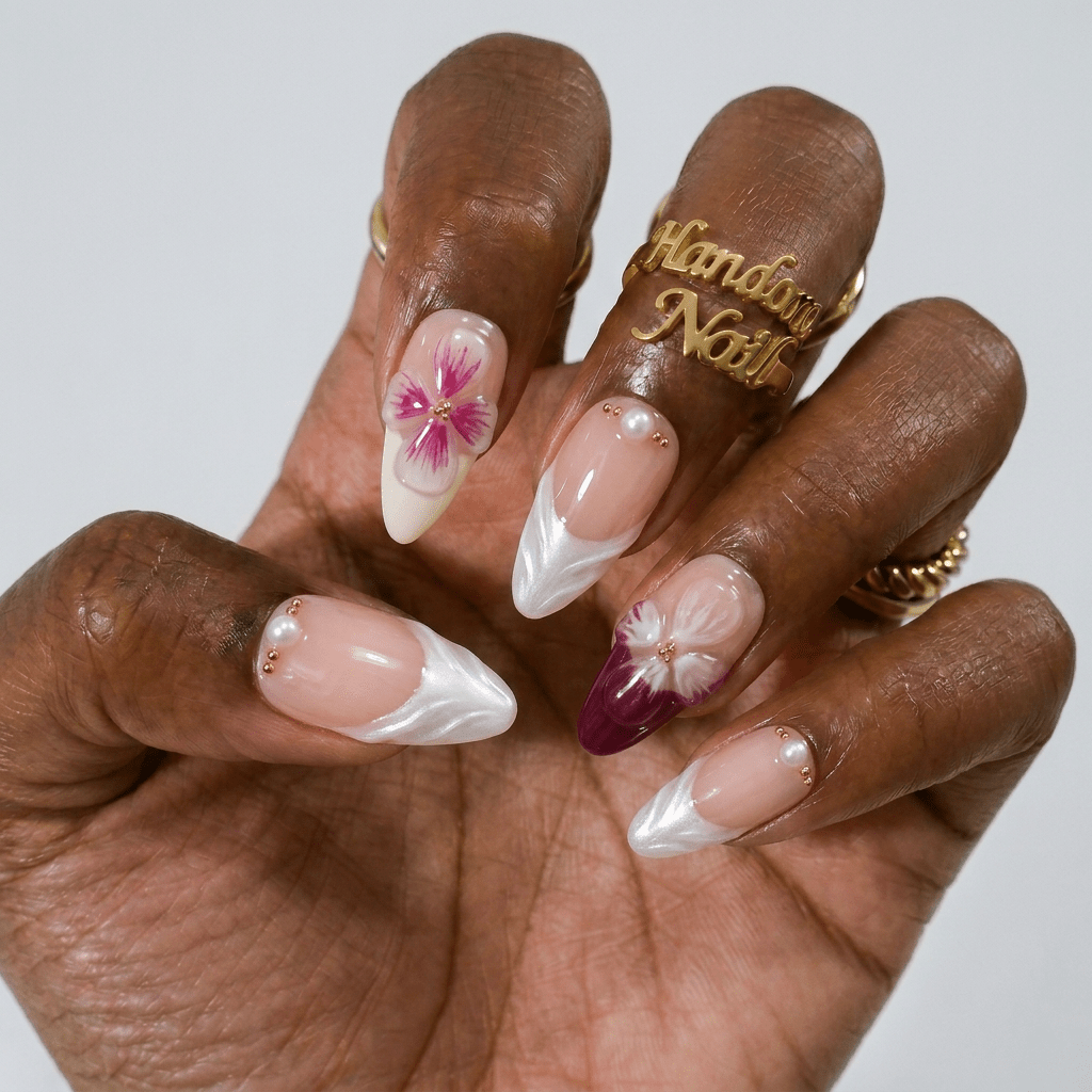 Orchid Elegance press-on nails worn on hand – almond shape by Handora