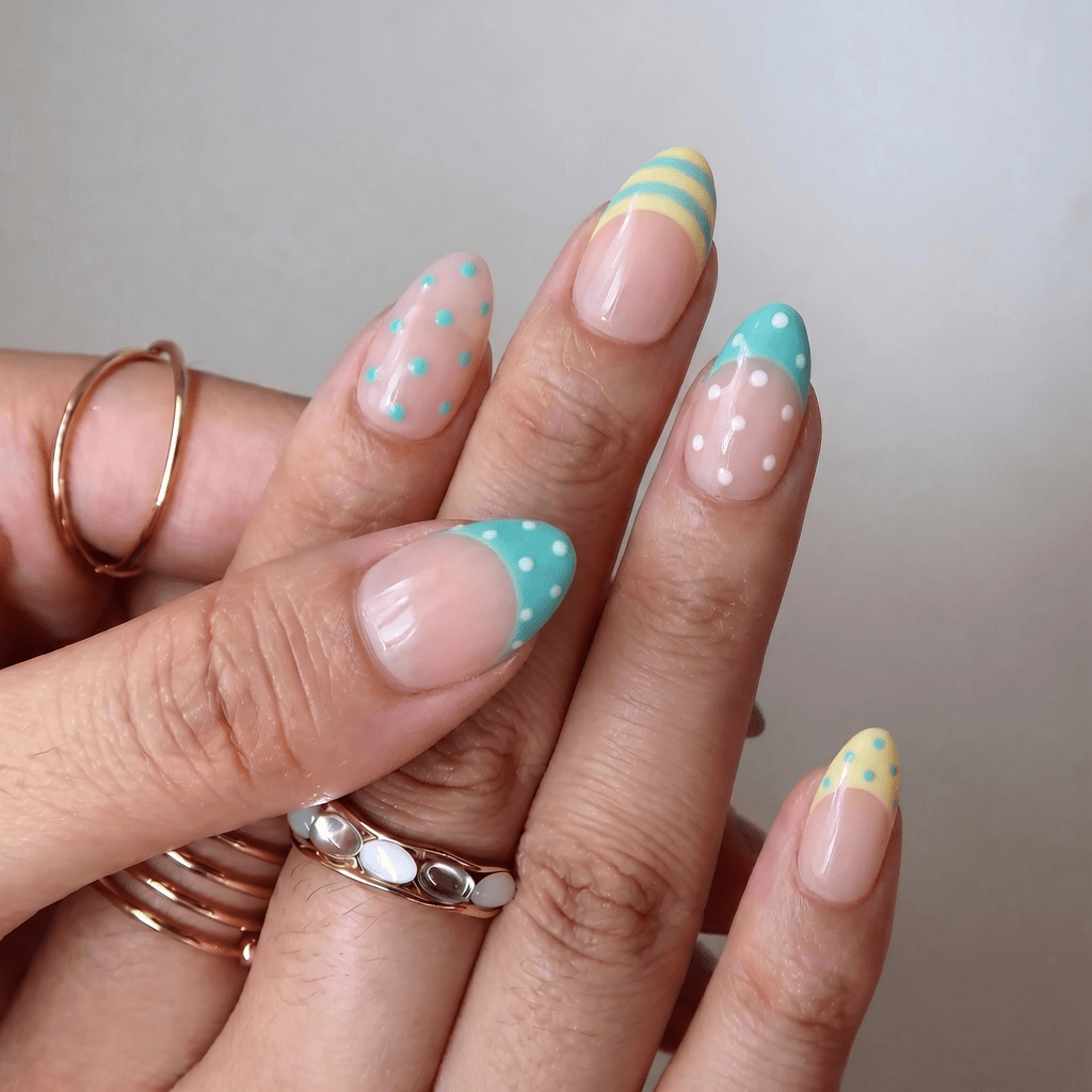 Pastel Dots press-on nails worn on hand – almond shape by Handora