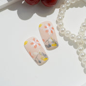 Peach Frost square press-on nails – design close-up by Handora