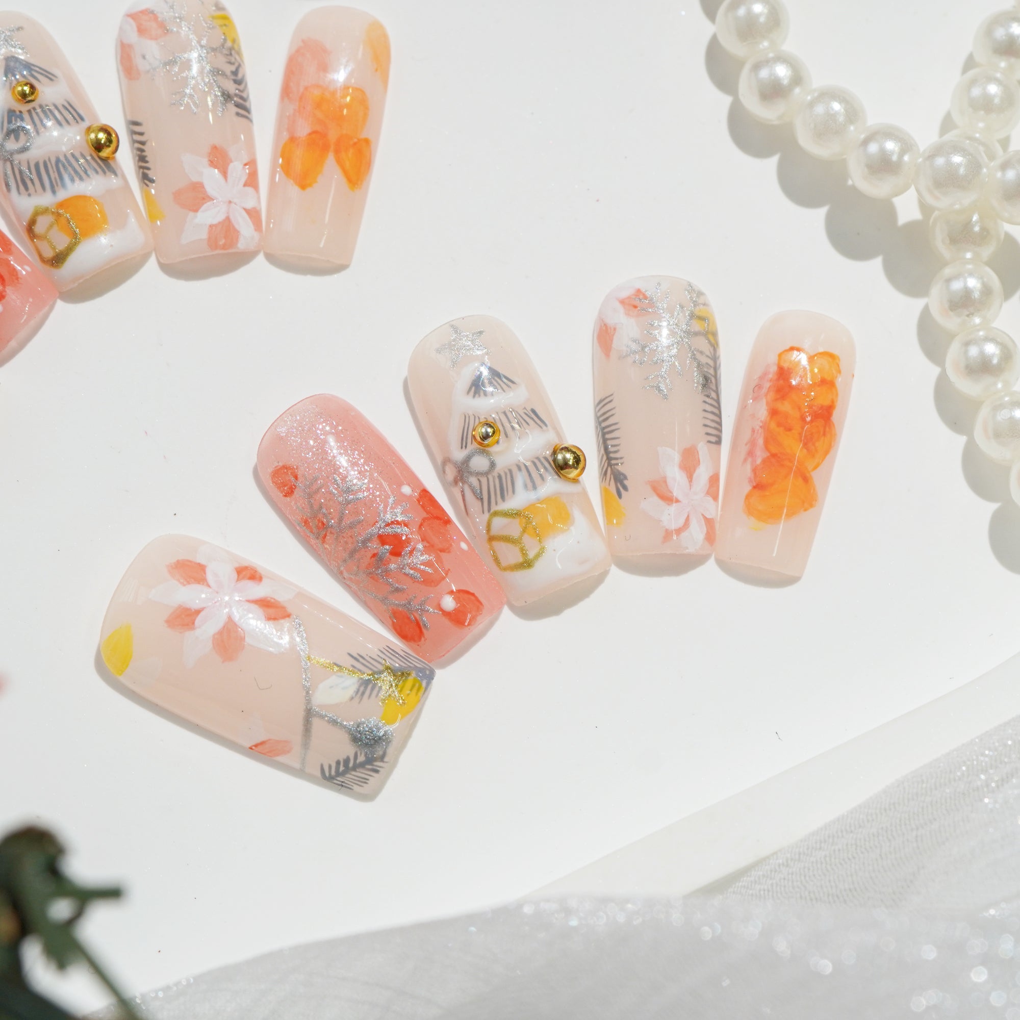 Peach Frost press-on nails worn on hand – square shape by Handora