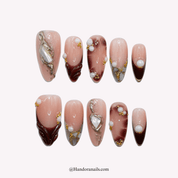 Pearl Glow white almond autumn press-on nails by Handora