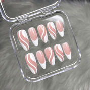 Pearl Wave press-on nails worn on hand – almond shape by Handora