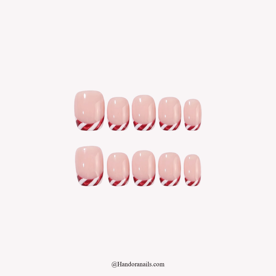 Peppermint Twist Christmas press-on nails - white background by Handora Nails