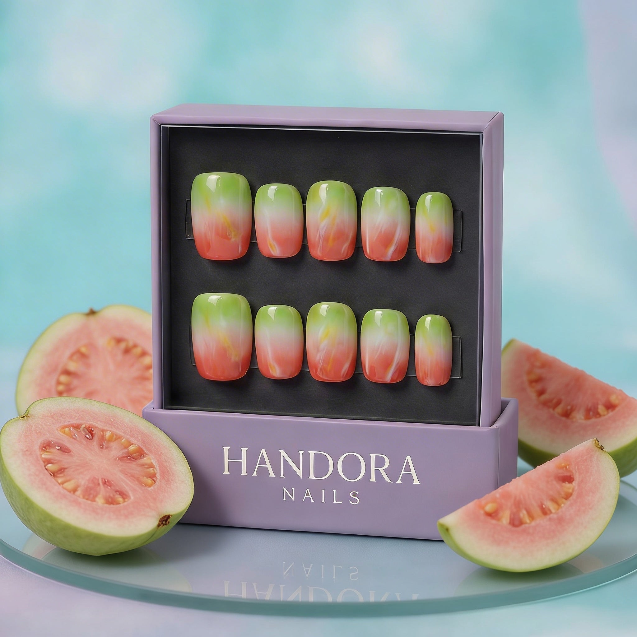 Pink Guava press-on nails worn on hand – almond shape by Handora