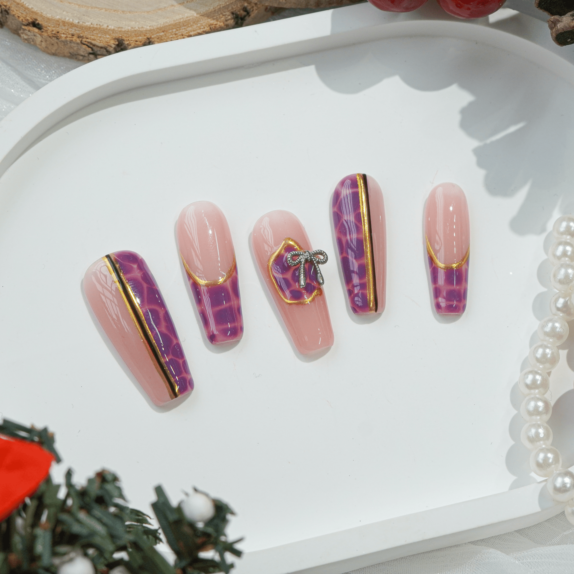 Plaid Magic press-on nails worn on hand – coffin shape by Handora