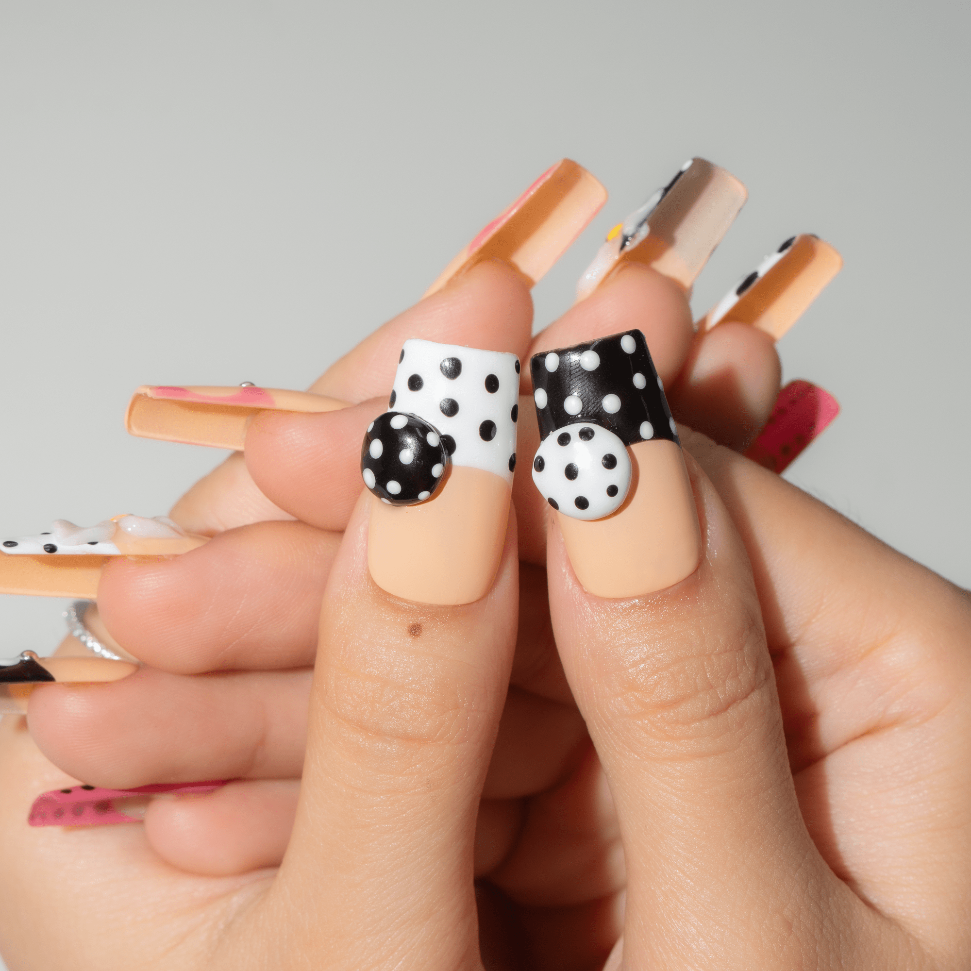 Polka Bloom Chic press-on nails – design close-up by Handora