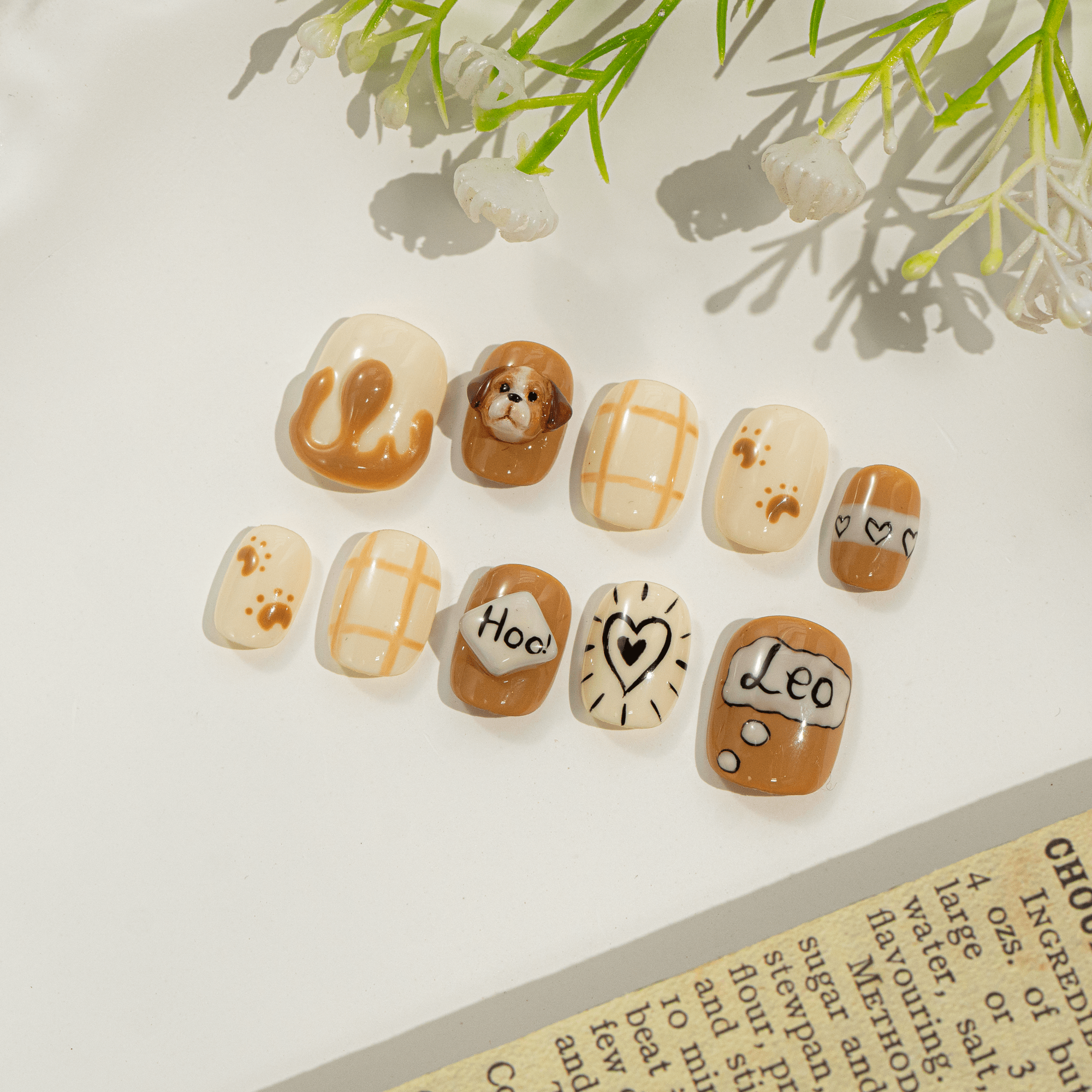Puppy Leo press-on nails – design close-up by Handora