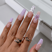 Purple Bloom press-on nails – design close-up by Handora