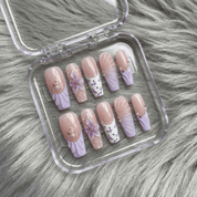 Purple Bloom press-on nails – hand-painted reusable gel set by Handora