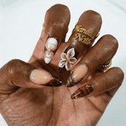 Red Bloom press-on nails – design close-up by Handora