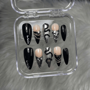 Reputation press-on nails worn on hand – almond shape by Handora