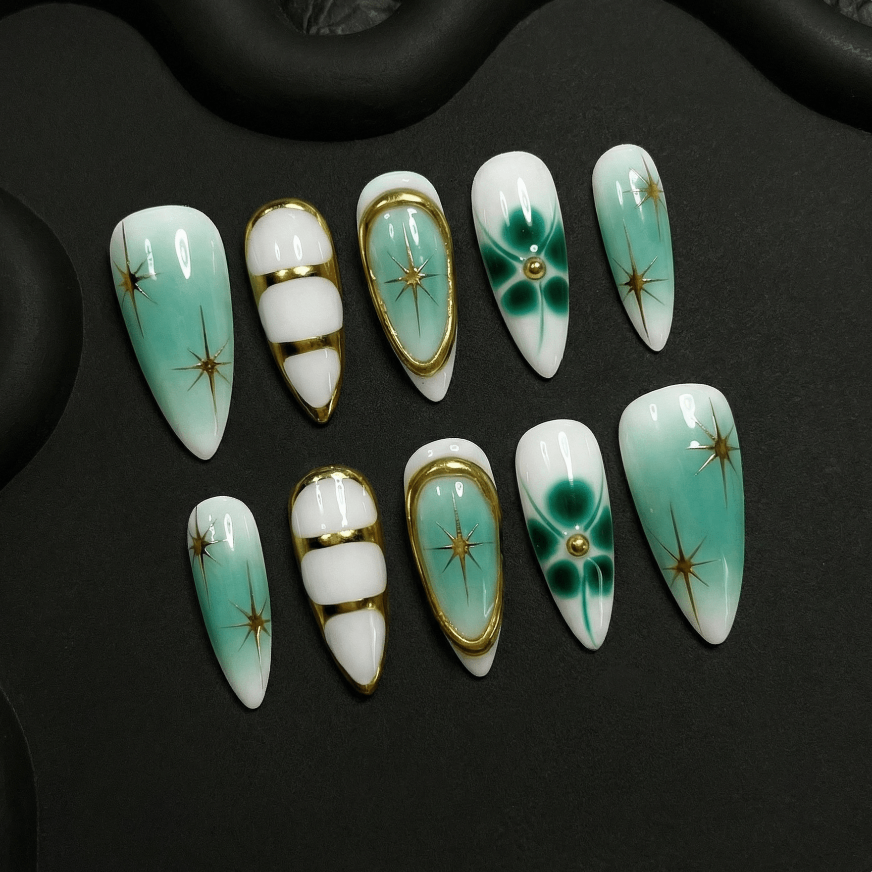 Retro Radiance press-on nails worn on hand – almond shape by Handora