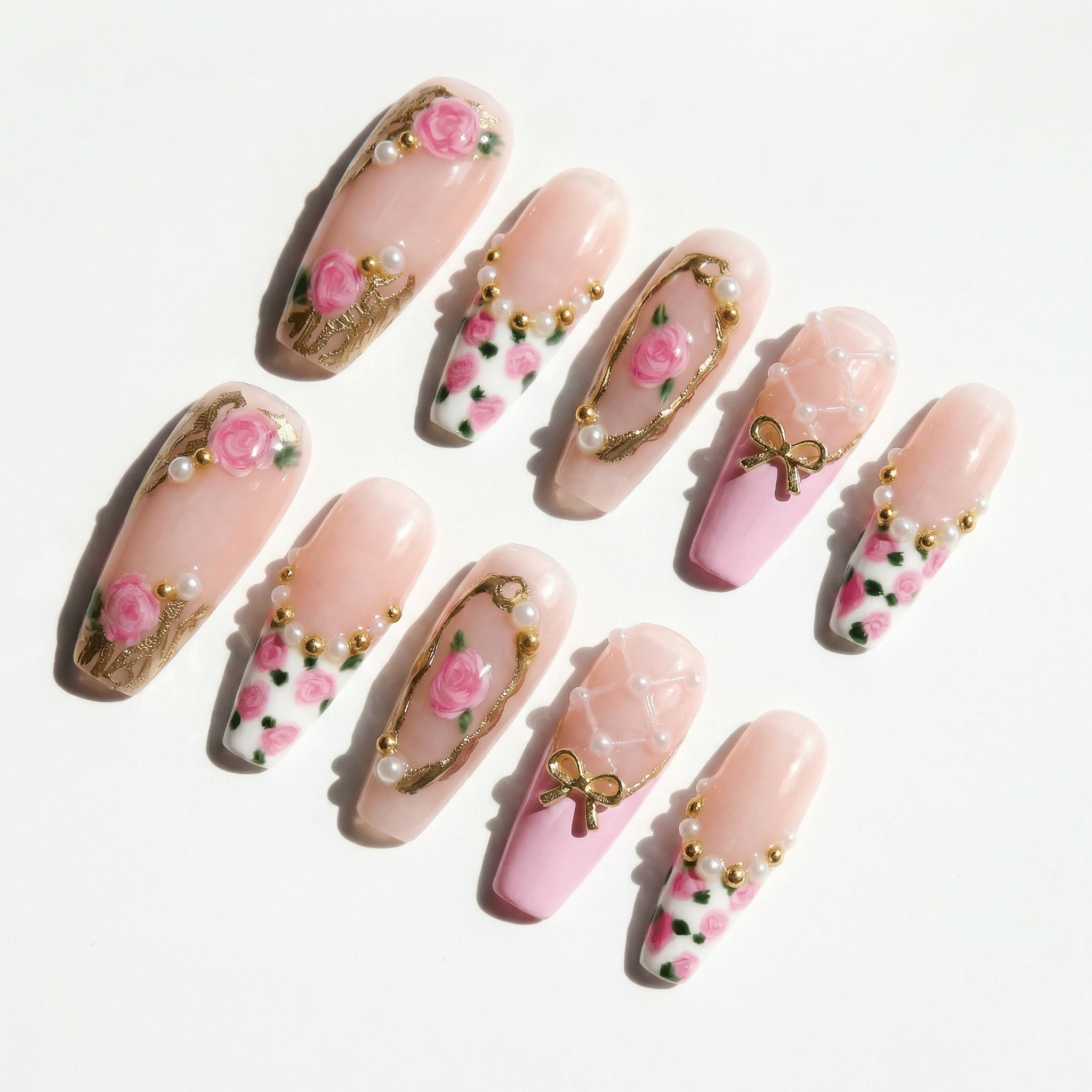 Rose Coquette press-on nails – hand-painted reusable gel set by Handora