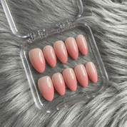 Rose Quartz press-on nails worn on hand – almond shape by Handora