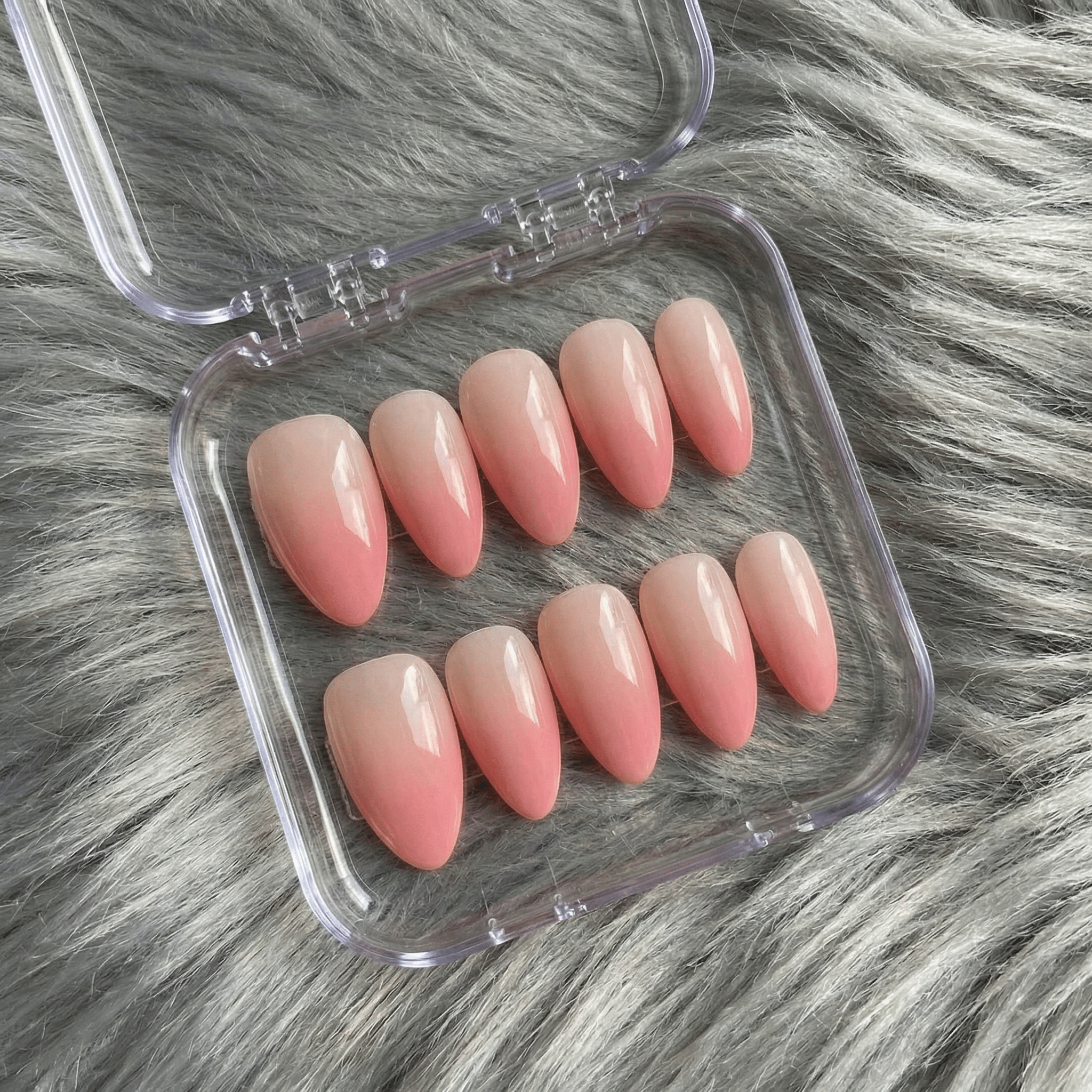 Rose Quartz press-on nails worn on hand – almond shape by Handora