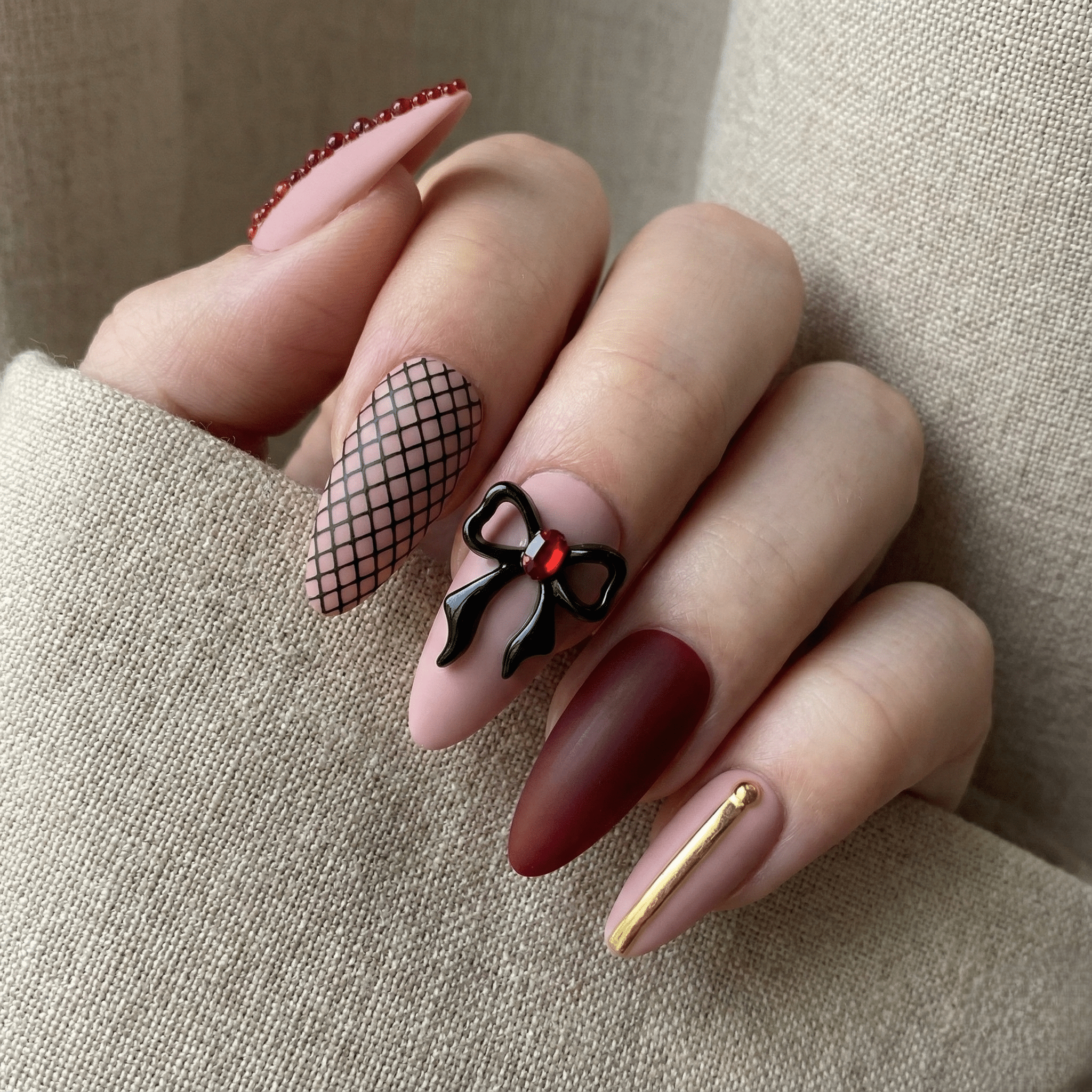 Ruby Corset nail design – handmade press-on nails by Handora