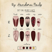 Ruby Lace press-on nails worn on hand – almond shape by Handora